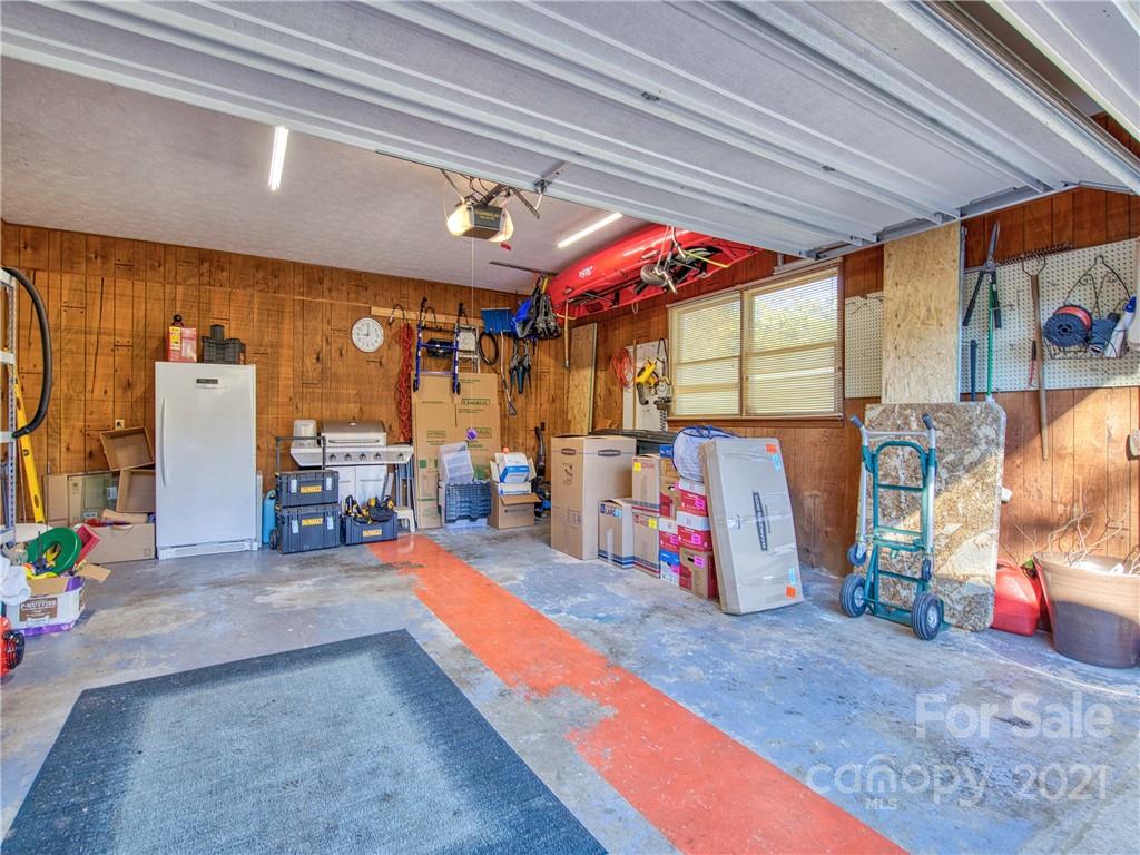 17 Royal Ridge Road Clyde, NC 28721 - Photo 38 of 38 a view of a garage with gym equipment
