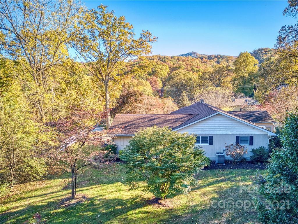 17 Royal Ridge Road Clyde, NC 28721 - Photo 6 of 38 a view of a house with a yard