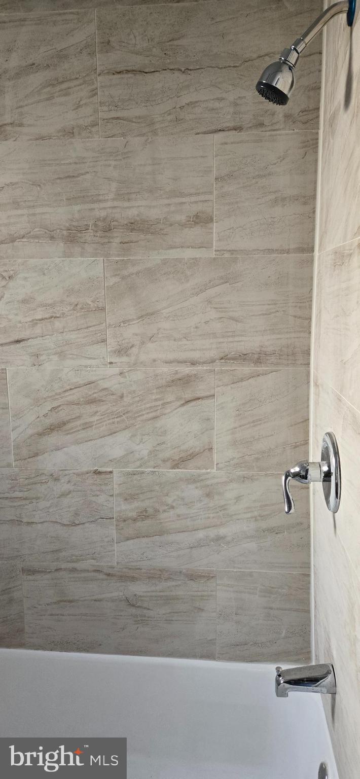 1609 South LeCount Street Philadelphia, PA 19145 - Photo 11 of 12 a bathroom with a shower