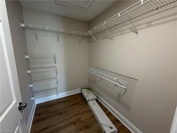 a view of a room with racks on the wall