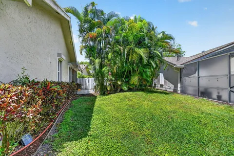 a view of a back yard of the house