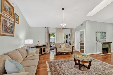 a living room with furniture or couch and a flat screen tv