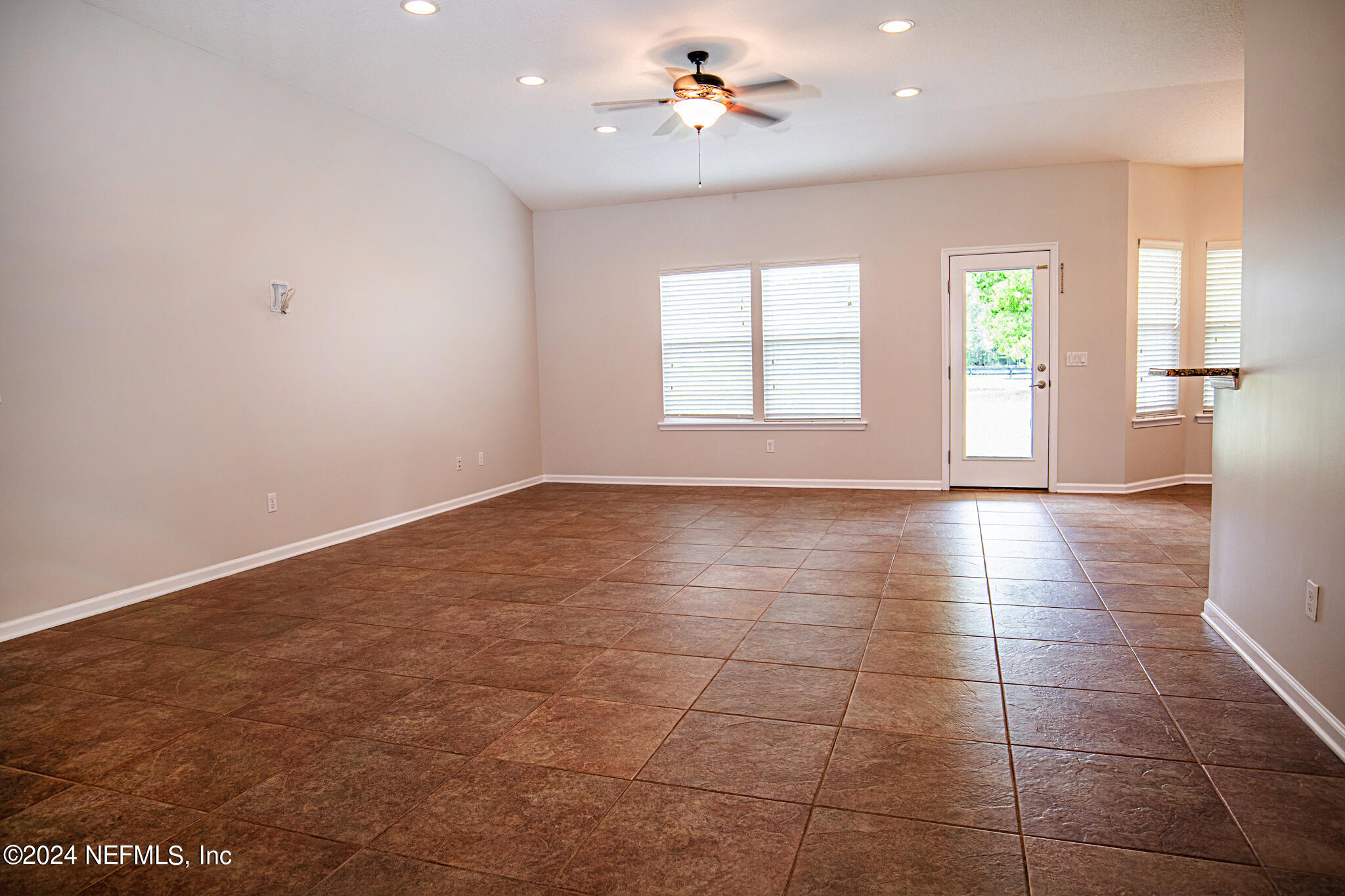 5285 Truman Pacetti Road St. Augustine, FL 32092 - Photo 17 of 31 Living Room area to back door