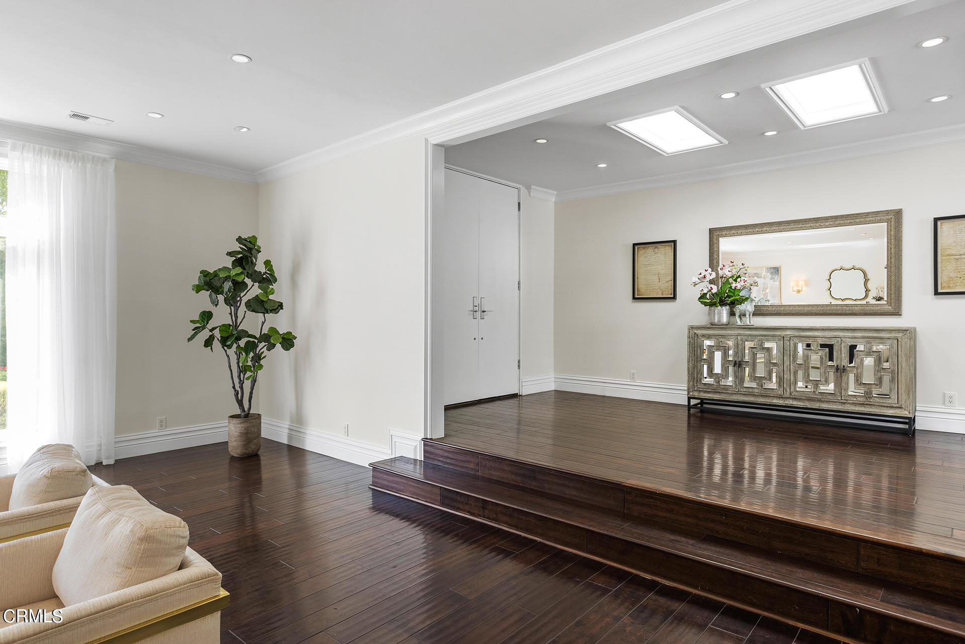 506 North Crescent Drive Beverly Hills, CA 90210 - Photo 2 of 36 a living room with furniture and a potted plant