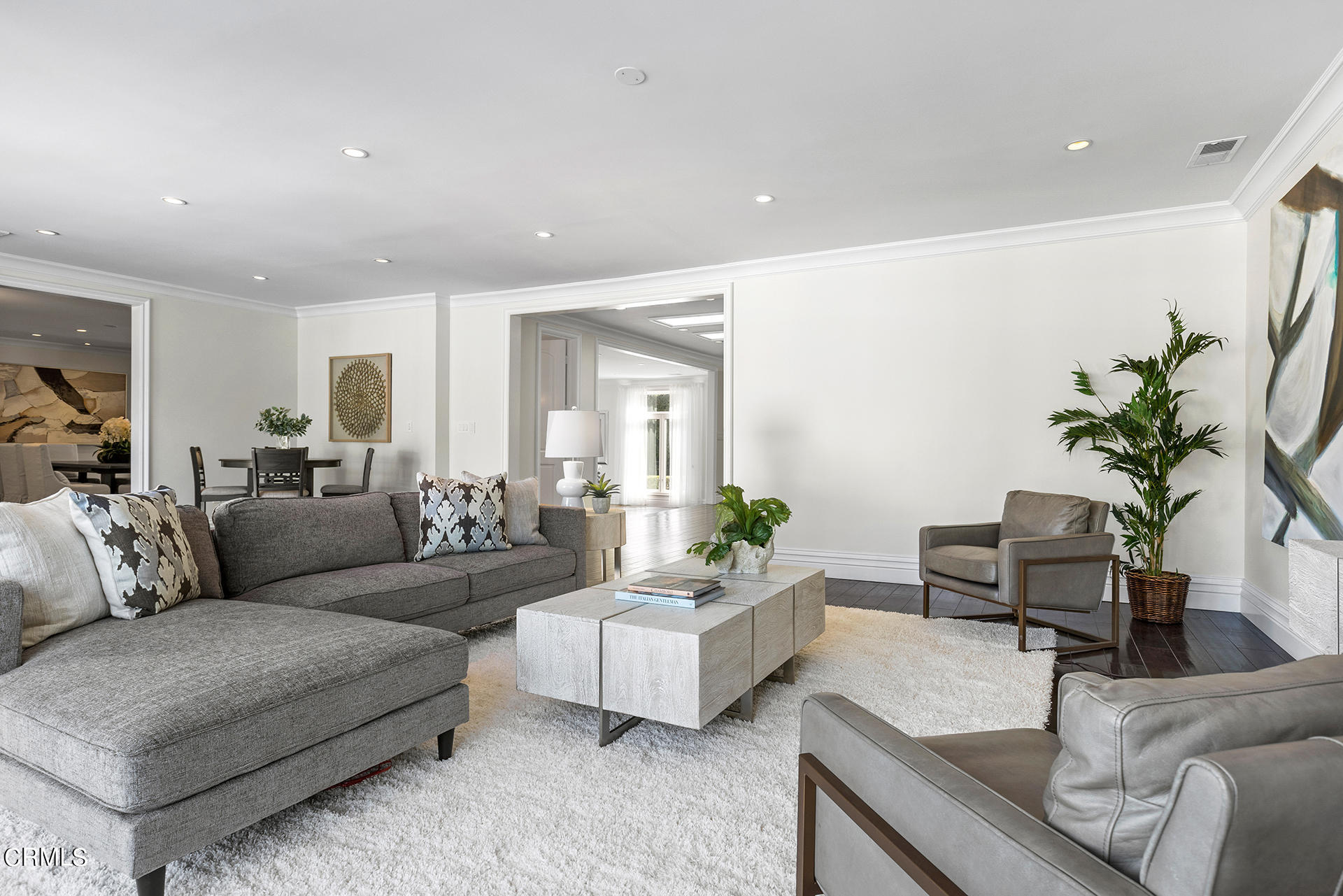506 North Crescent Drive Beverly Hills, CA 90210 - Photo 12 of 36 a living room with furniture and a potted plant