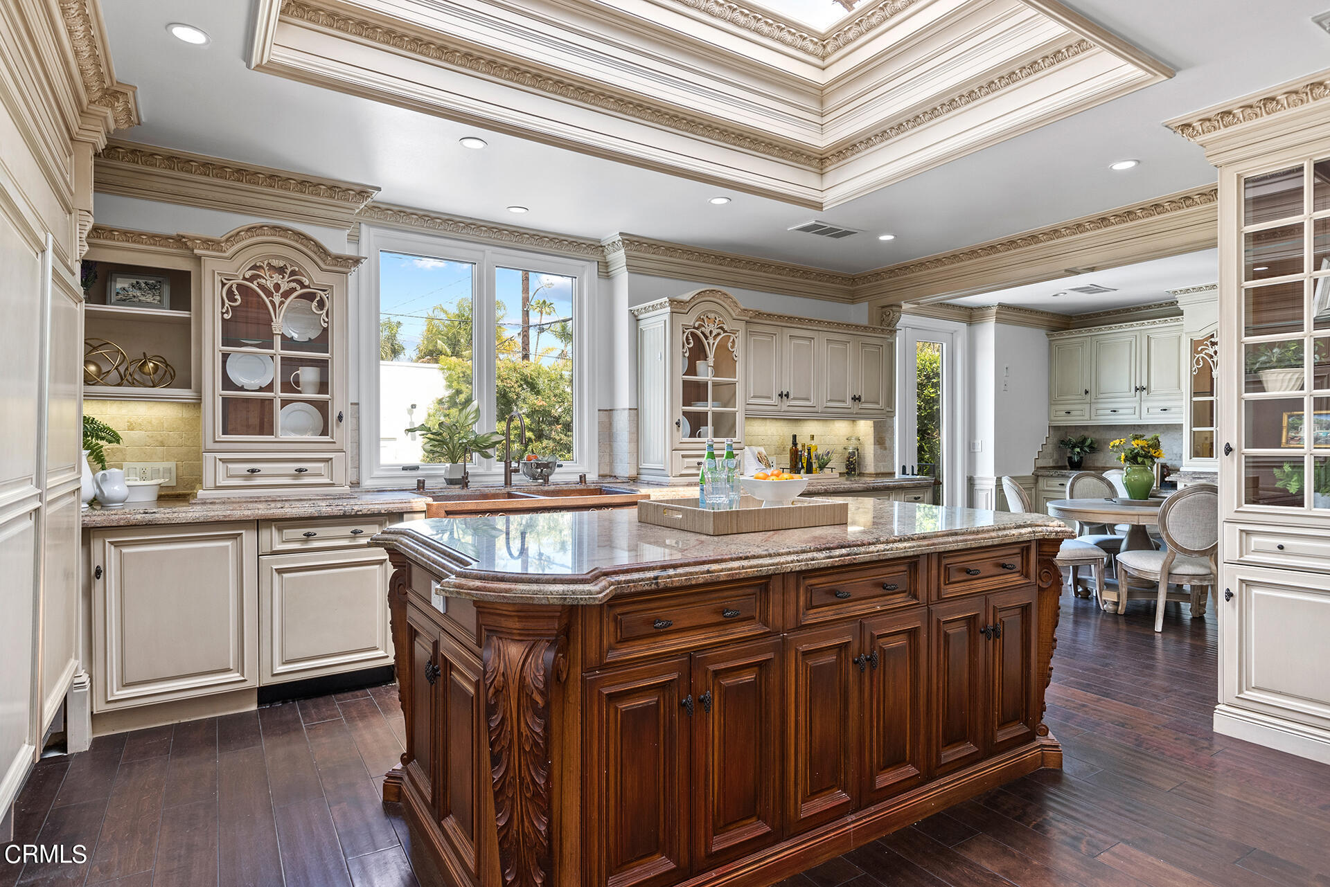 506 North Crescent Drive Beverly Hills, CA 90210 - Photo 13 of 36 a kitchen with center island and stainless steel appliances