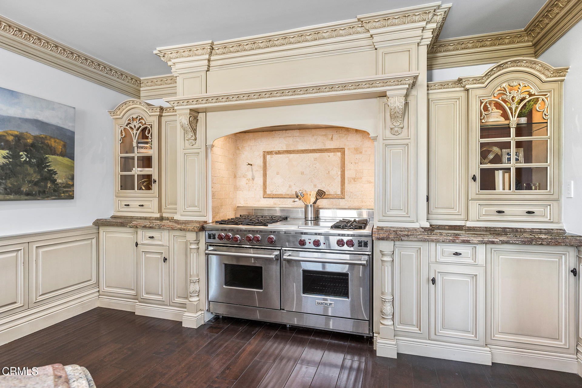 506 North Crescent Drive Beverly Hills, CA 90210 - Photo 14 of 36 a kitchen with stainless steel appliances granite countertop a stove and a white cabinet