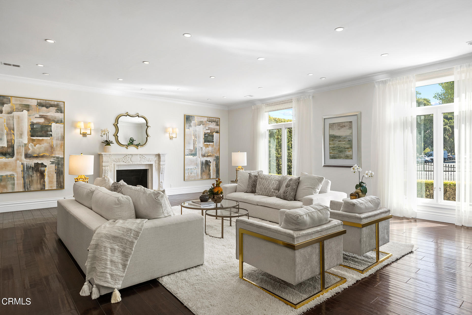 506 North Crescent Drive Beverly Hills, CA 90210 - Photo 3 of 36 a living room with furniture a fireplace and a large window