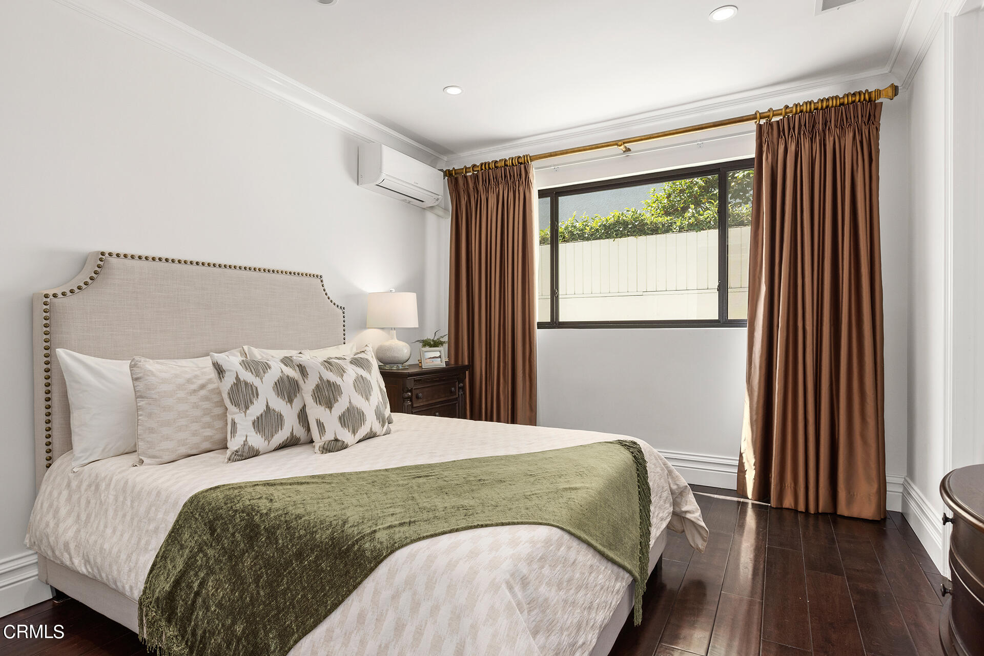 506 North Crescent Drive Beverly Hills, CA 90210 - Photo 22 of 36 a bedroom with a large bed and a window