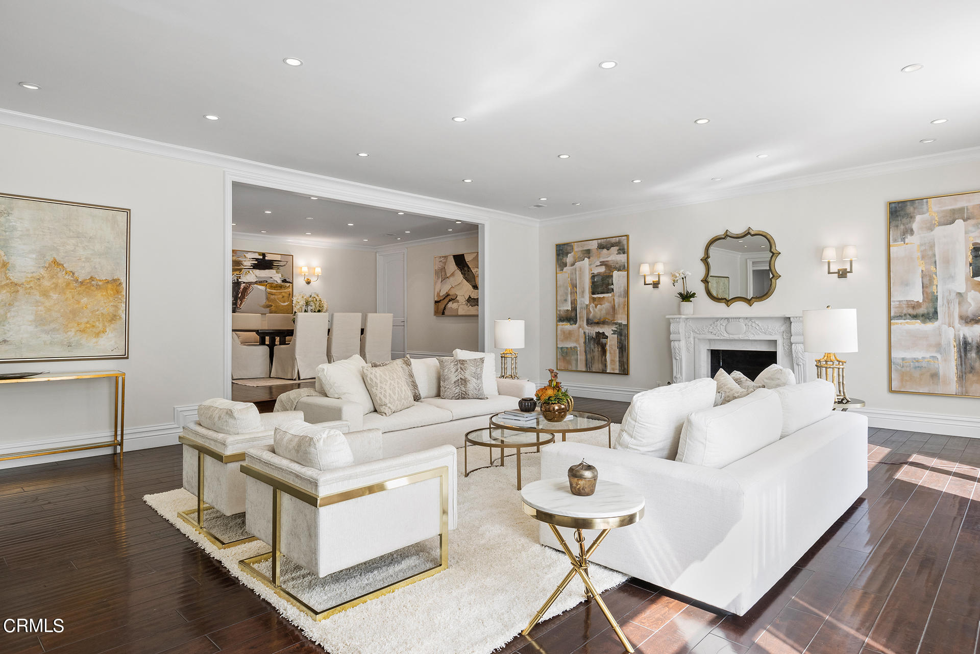 506 North Crescent Drive Beverly Hills, CA 90210 - Photo 4 of 36 a living room with furniture a fireplace and a large window