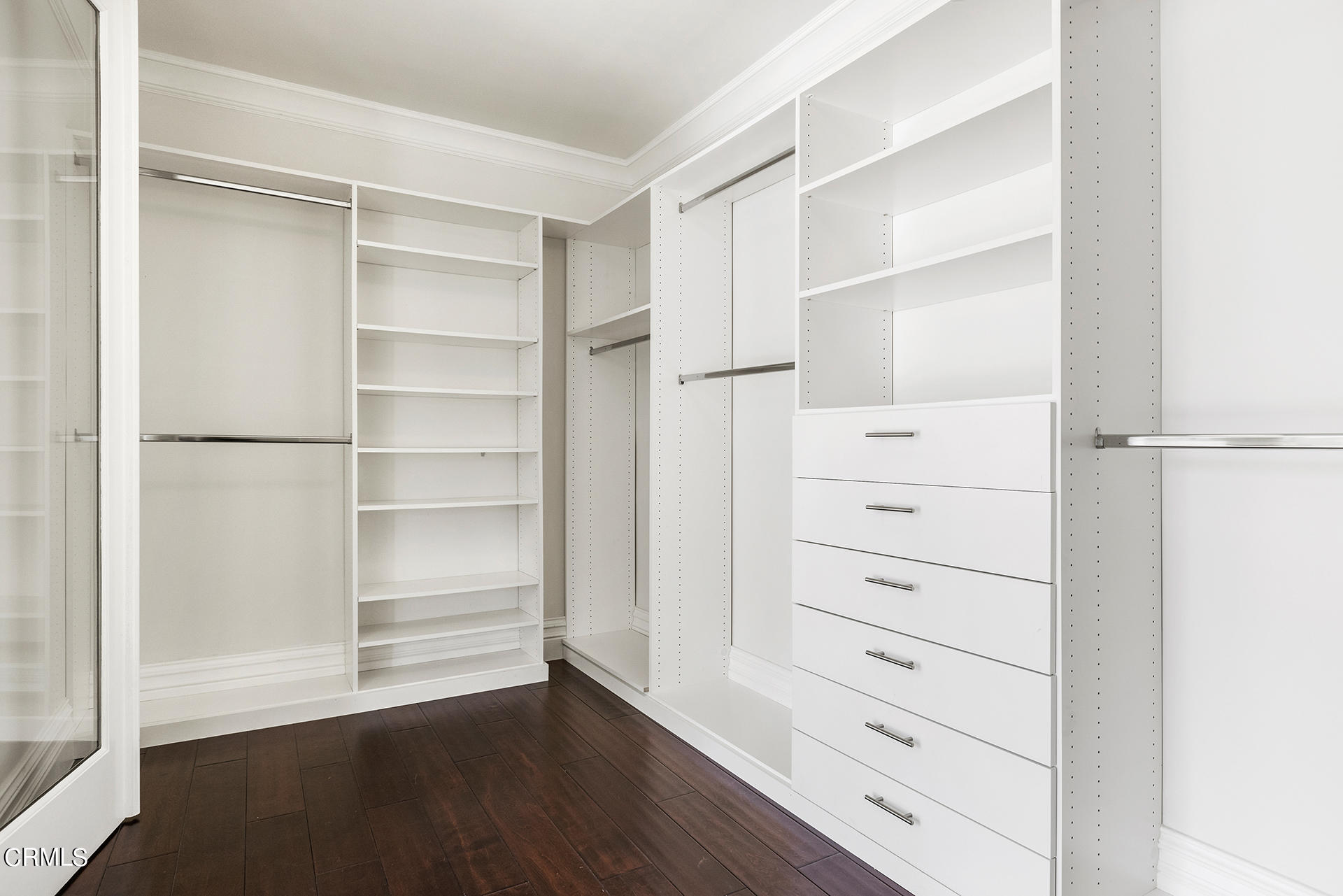 506 North Crescent Drive Beverly Hills, CA 90210 - Photo 31 of 36 a view of walk in closet with empty racks