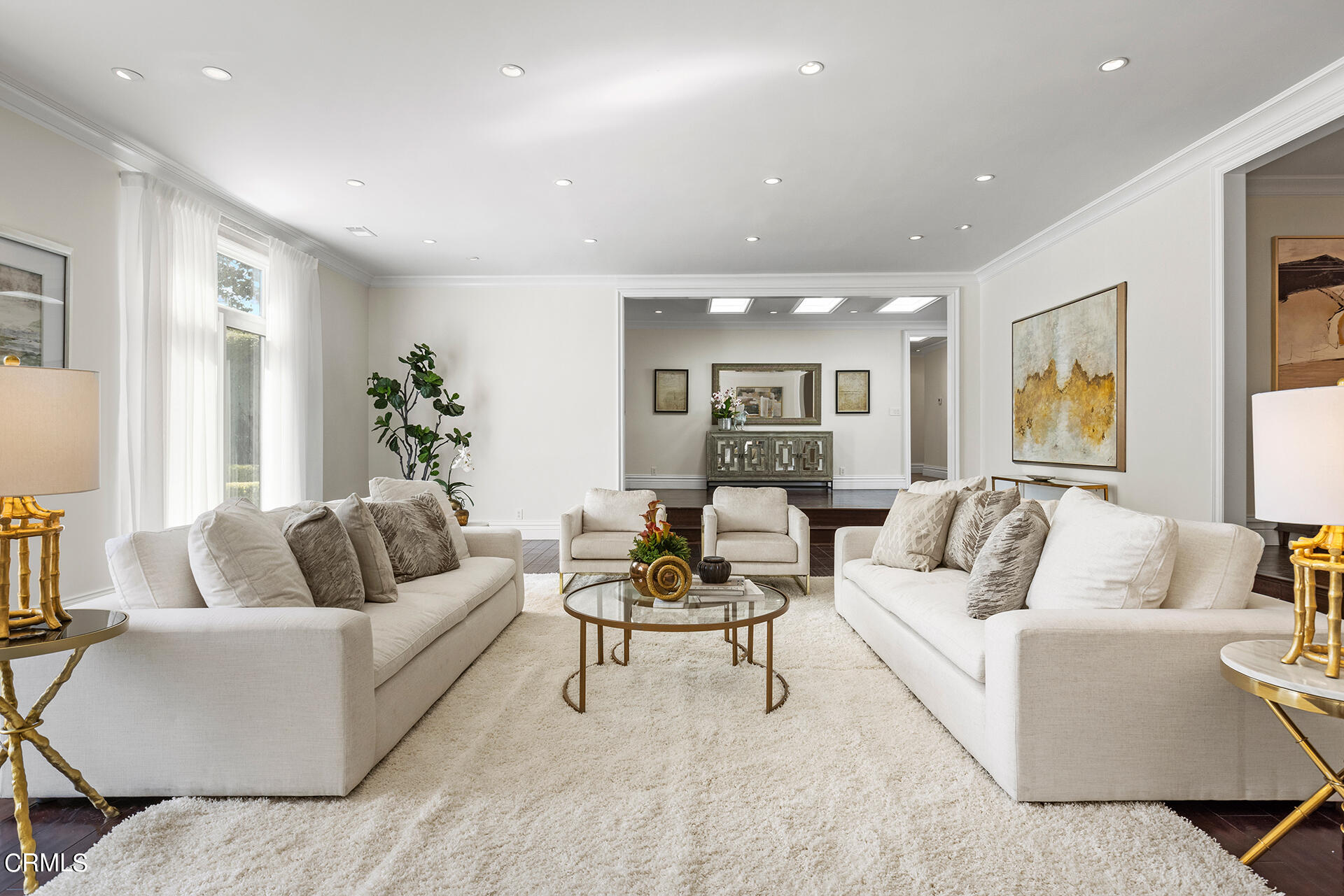506 North Crescent Drive Beverly Hills, CA 90210 - Photo 6 of 36 a living room with furniture and a large window