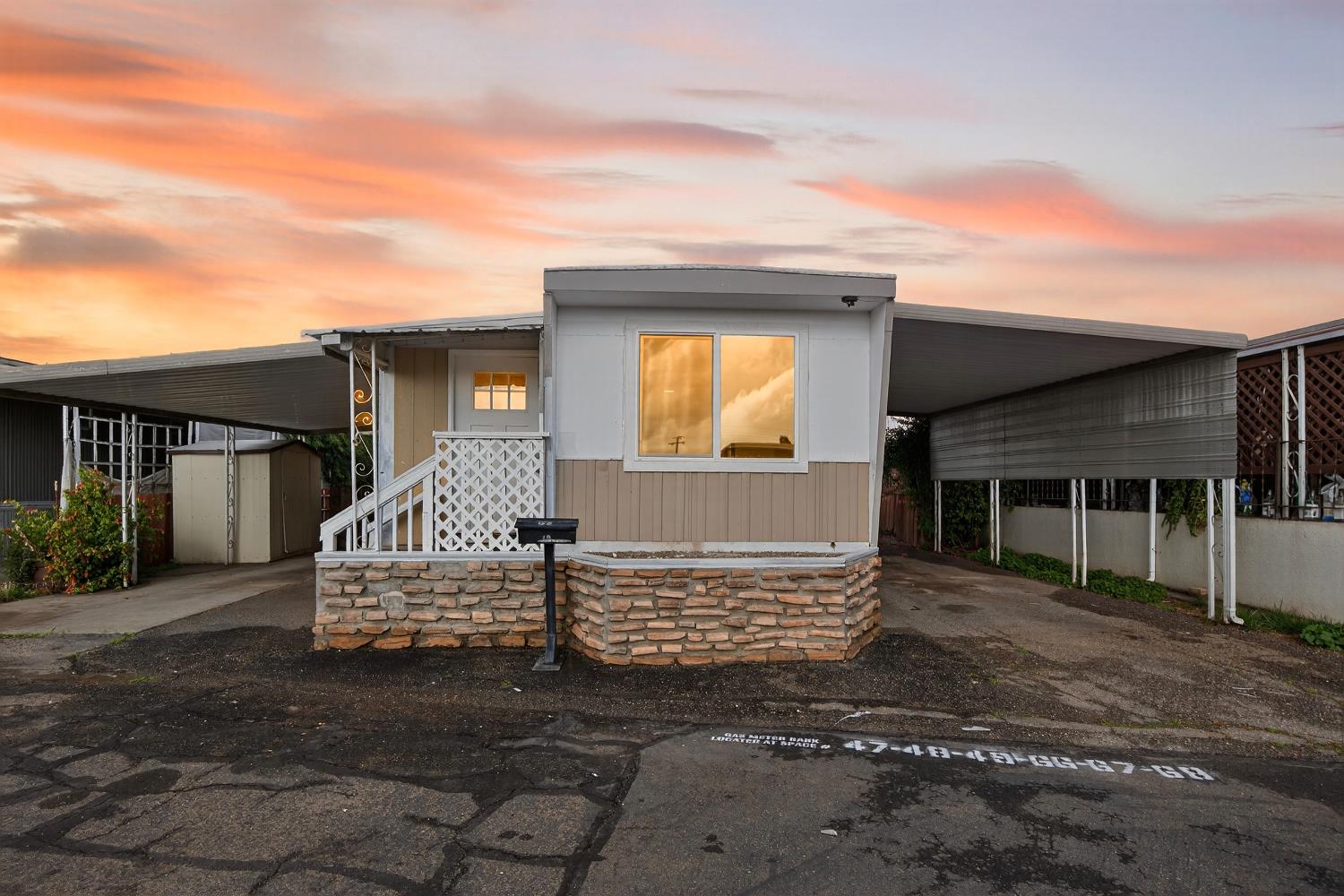 a front view of a house with a porch