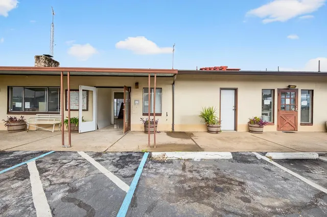 a view of a house with patio