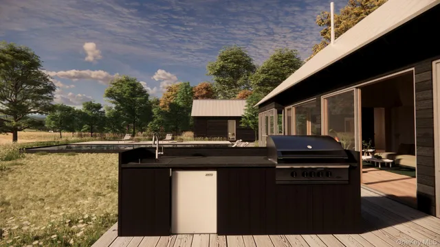 a roof deck with a table and chairs and potted plants