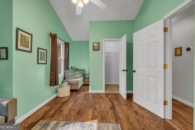 a view of balcony with wooden floor and outdoor space