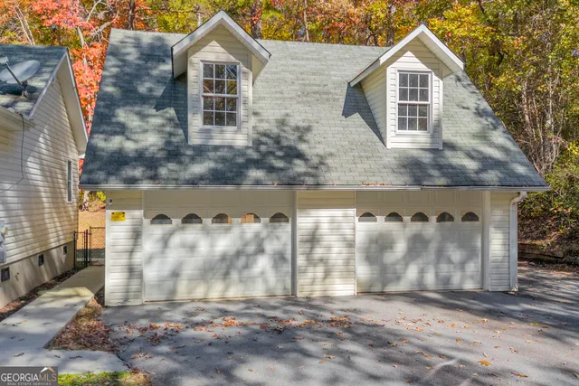 a view of a room with wooden walls