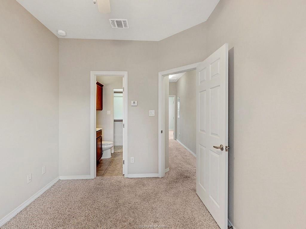 1198 Jones-Butler Road, Unit 2607 College Station, TX 77840 - Photo 23 of 26 an empty room with closet and a bathroom