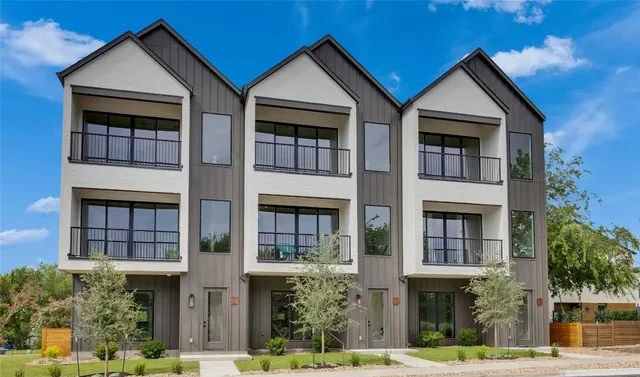 a front view of residential houses