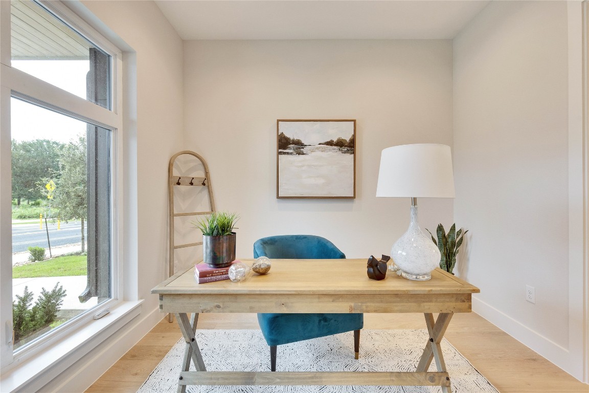 1937 East 38th 1/2 Street, Unit B Austin, TX 78723 - Photo 7 of 23 a living room with furniture and wooden floor