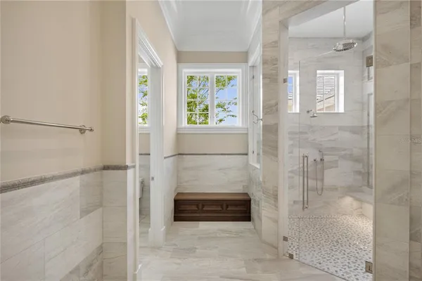 a bathroom with a granite countertop sink a mirror and a vanity