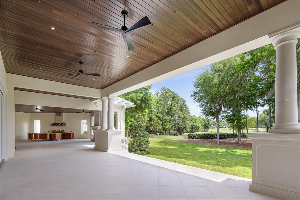 8707 Northwest 31st Lane Road Ocala, FL 34482 - Photo 46 of 50 a view of a porch and garden