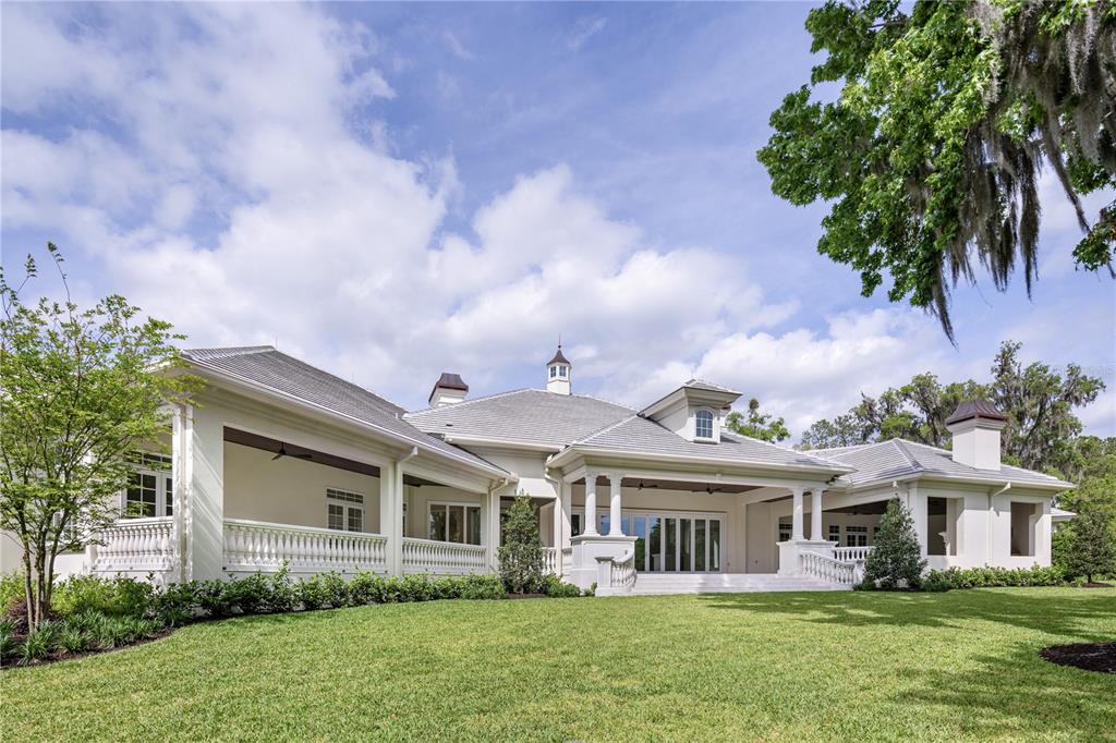 8707 Northwest 31st Lane Road Ocala, FL 34482 - Photo 49 of 50 a front view of house with yard and green space