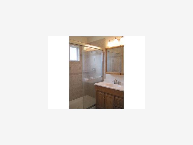 7150 Bollinger Road San Jose, CA 95129 - Photo 7 of 7 a bathroom with a sink and a mirror