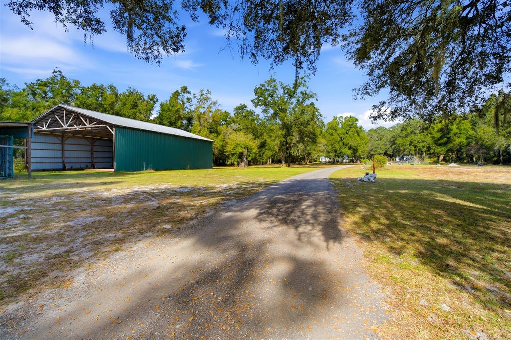 2804 Southwest 67th Lane Bushnell, FL 33513 - Photo 14 of 48 a view of an outdoor space and a yard