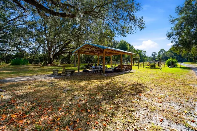 a view of a lake with a yard