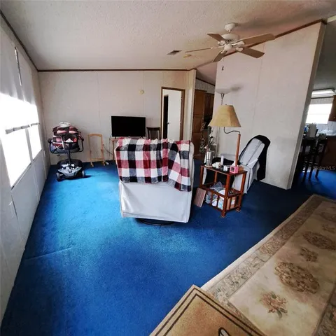 a room with furniture and a window