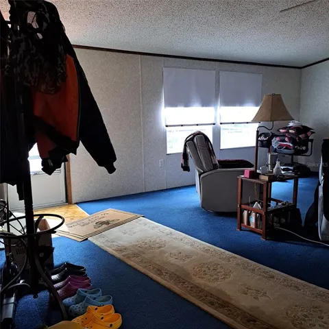 a room with furniture and a chandelier