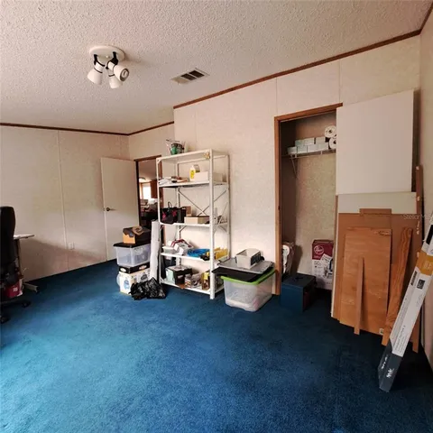 wooden floor with a rug