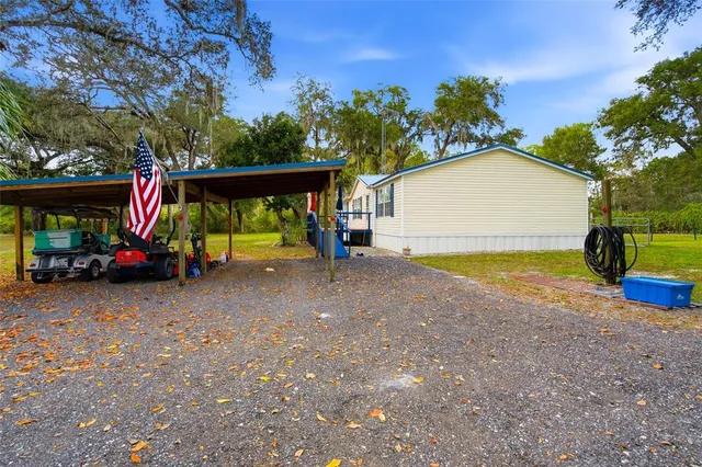 a view of outdoor space with deck and barbeque oven