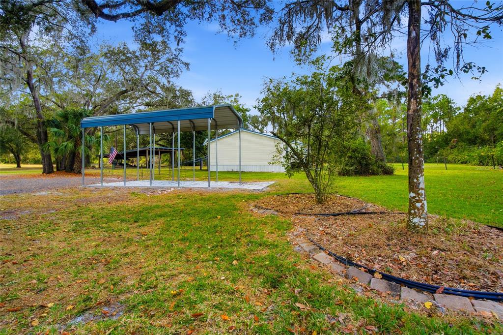 2804 Southwest 67th Lane Bushnell, FL 33513 - Photo 9 of 48 a view of a house with a yard