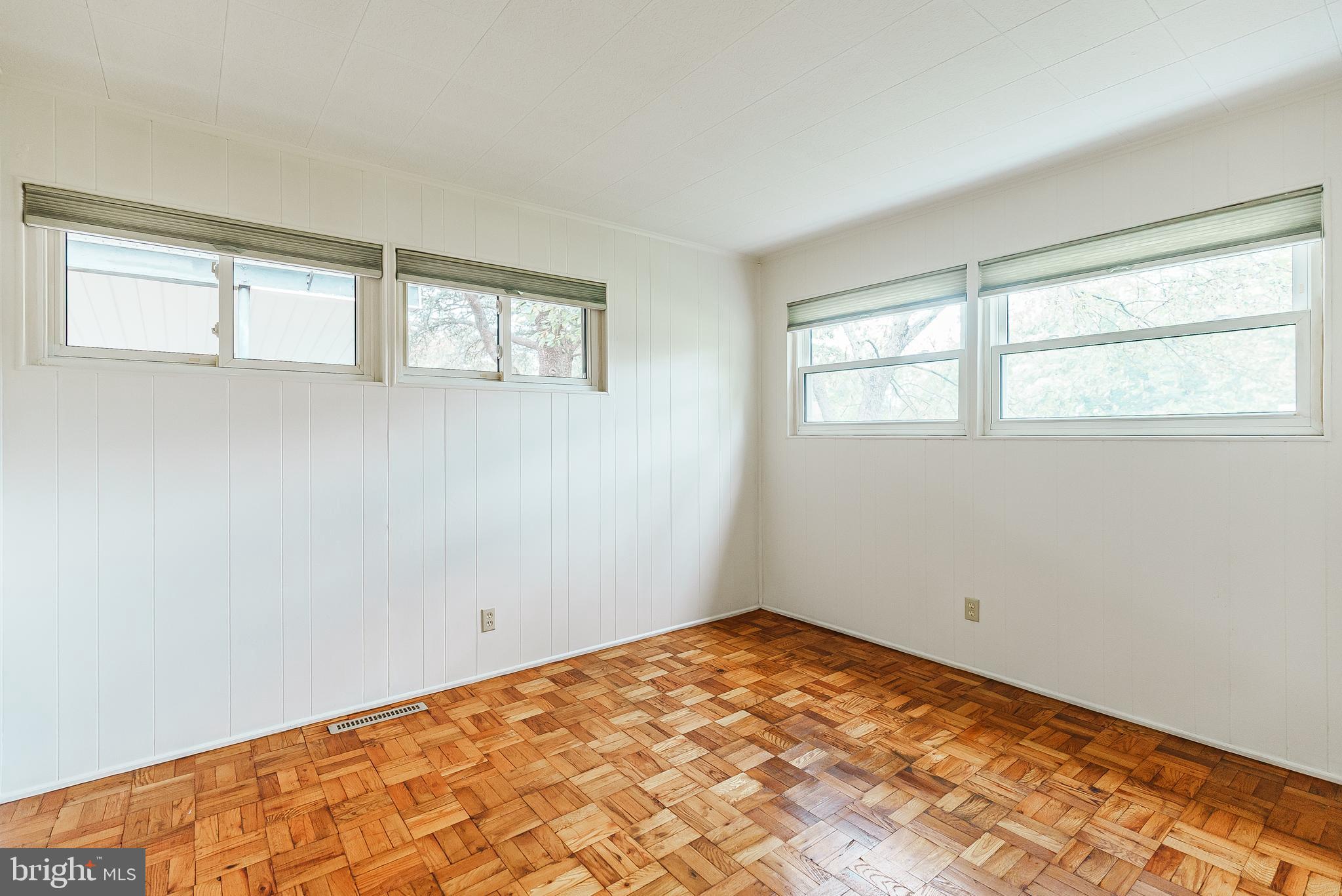 548 Paddock Road Ambler, PA 19002 - Photo 12 of 15 a view of empty room with wooden floor