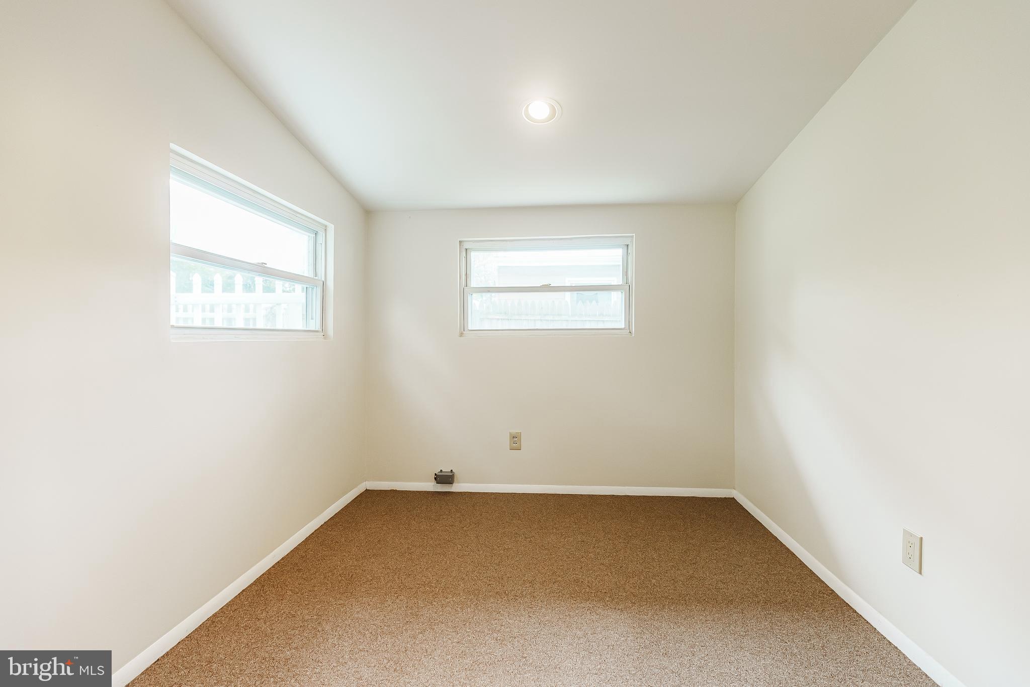 548 Paddock Road Ambler, PA 19002 - Photo 8 of 15 an empty room with a window