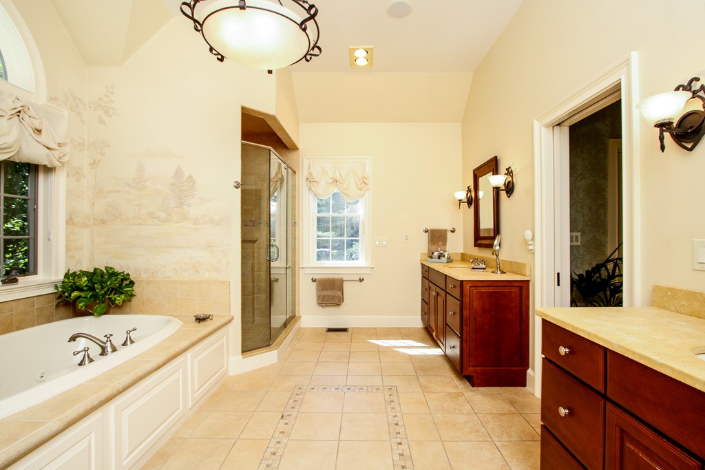 36 Dana Road Boxford, MA 01921 - Photo 13 of 28 a spacious bathroom with a tub sink and mirror