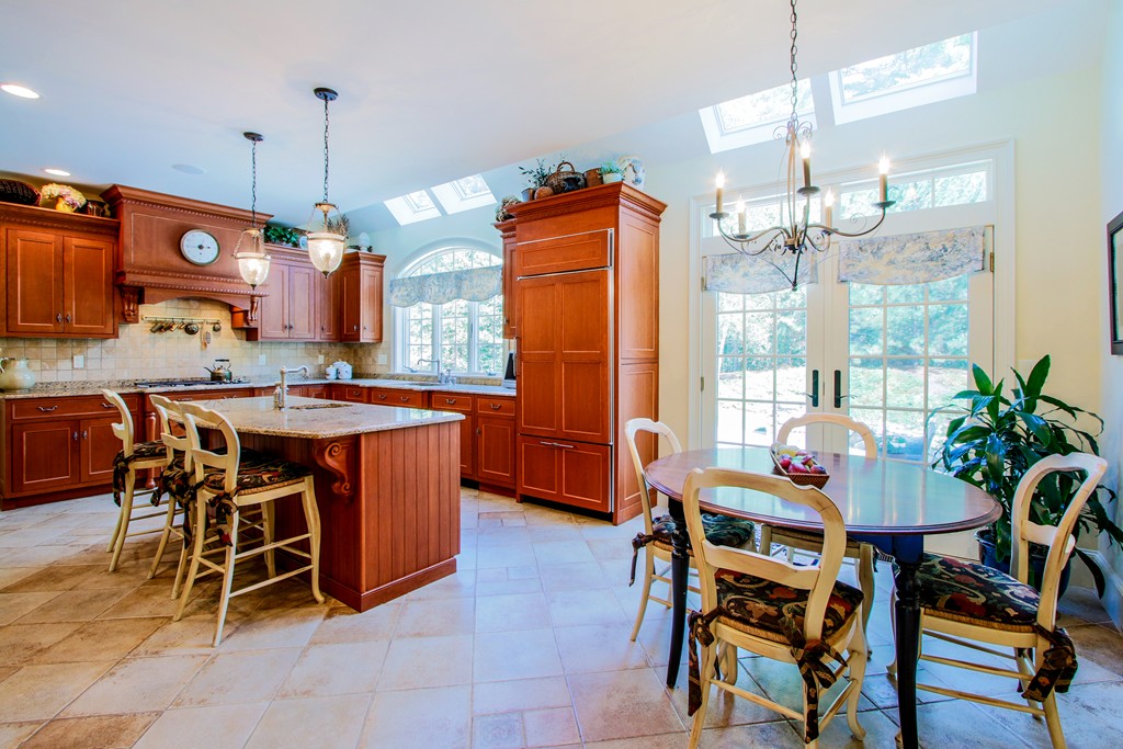36 Dana Road Boxford, MA 01921 - Photo 7 of 28 a dining room filled with furniture and a chandelier