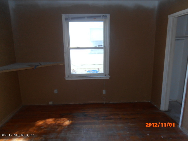 1748 Mayfair Road Jacksonville, FL 32207 - Photo 8 of 8 a view of an empty room with a window