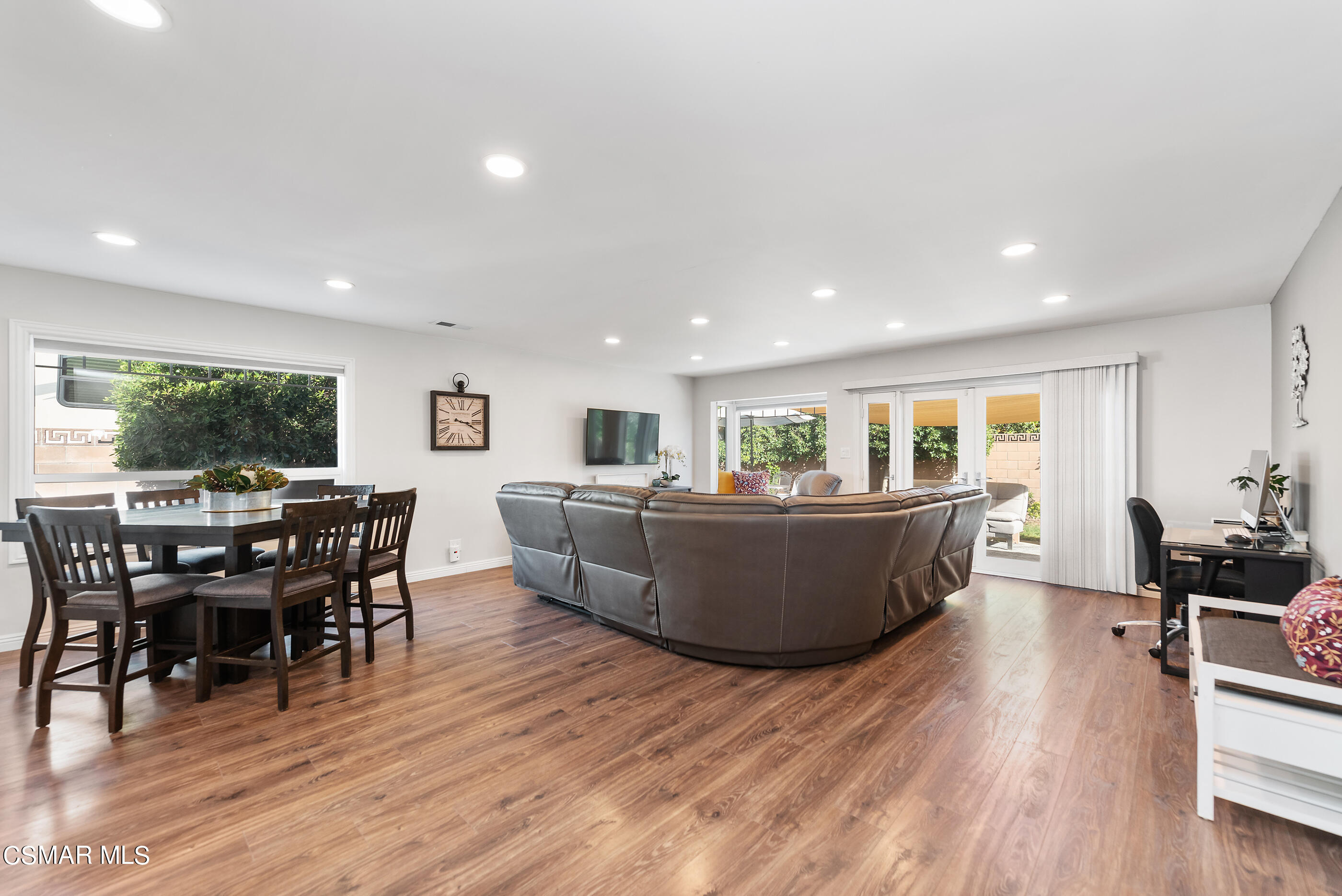 2066 Hurles Avenue Simi Valley, CA 93063 - Photo 11 of 50 a living room with furniture and a wooden floor