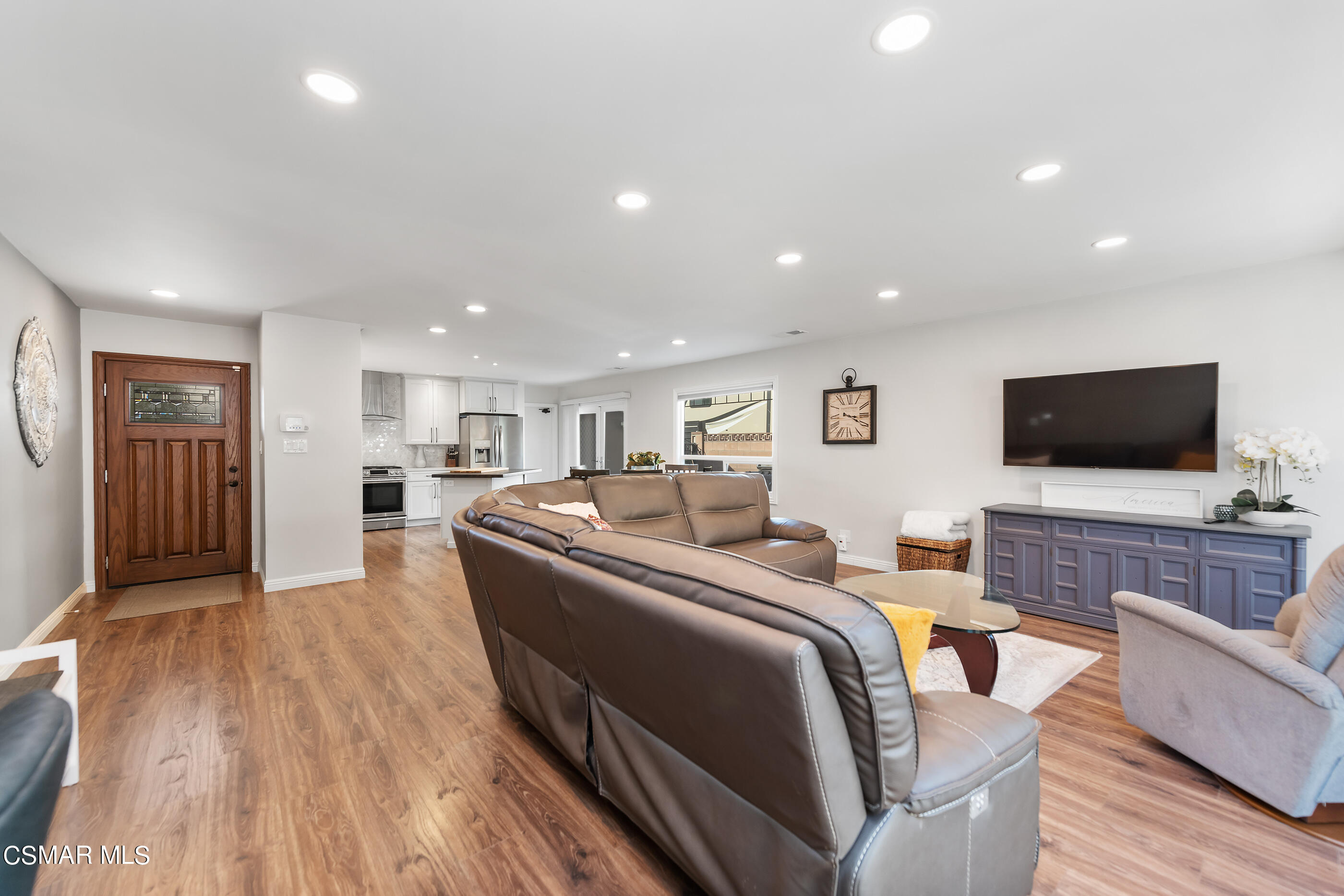 2066 Hurles Avenue Simi Valley, CA 93063 - Photo 12 of 50 a living room with furniture and a flat screen tv