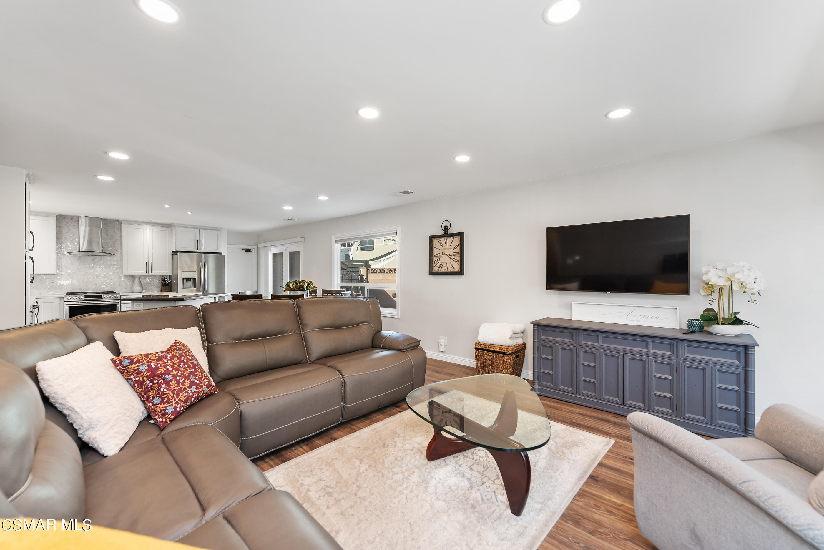 2066 Hurles Avenue Simi Valley, CA 93063 - Photo 13 of 50 a living room with furniture and a flat screen tv