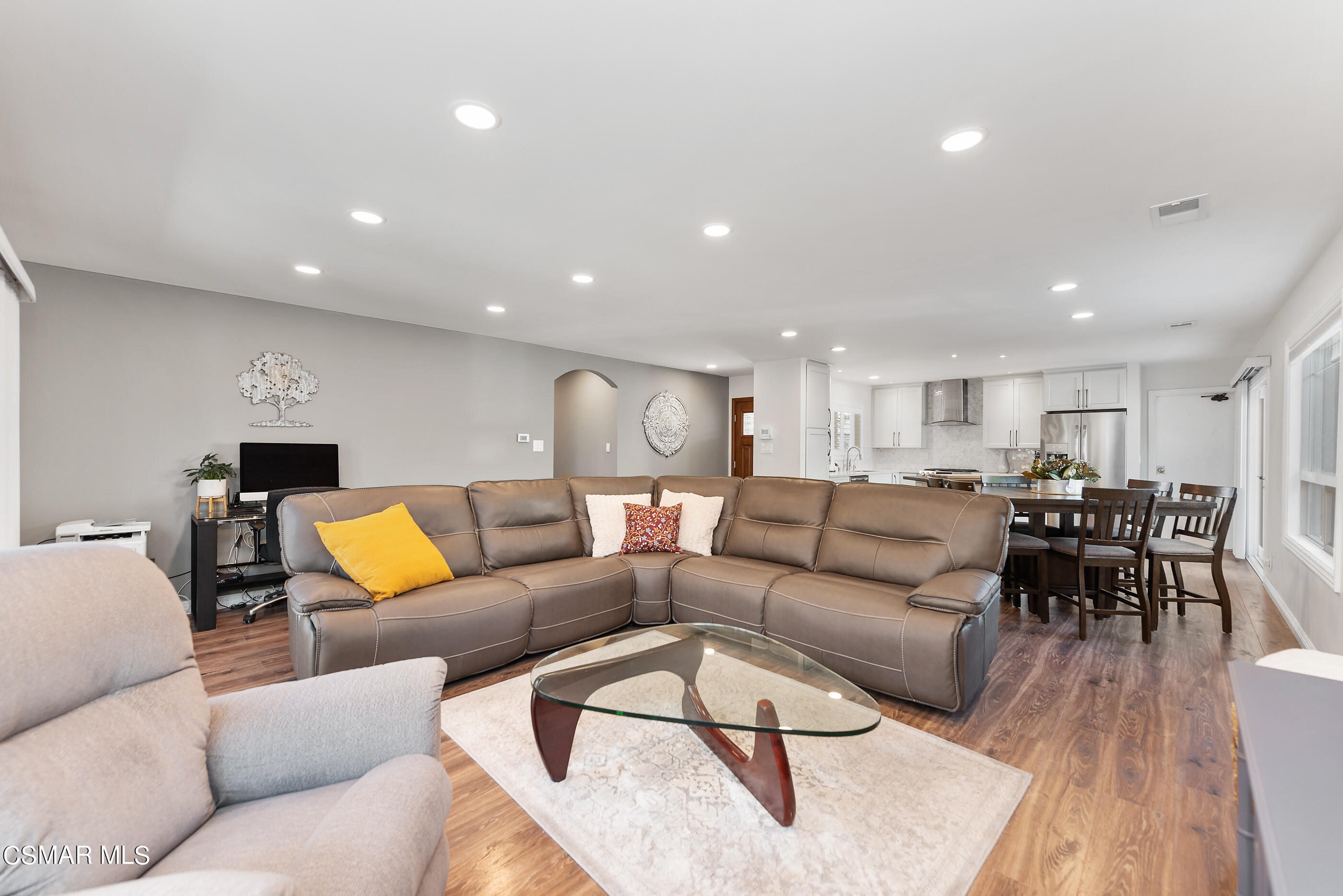 2066 Hurles Avenue Simi Valley, CA 93063 - Photo 14 of 50 a living room with furniture wooden floor and a dining table