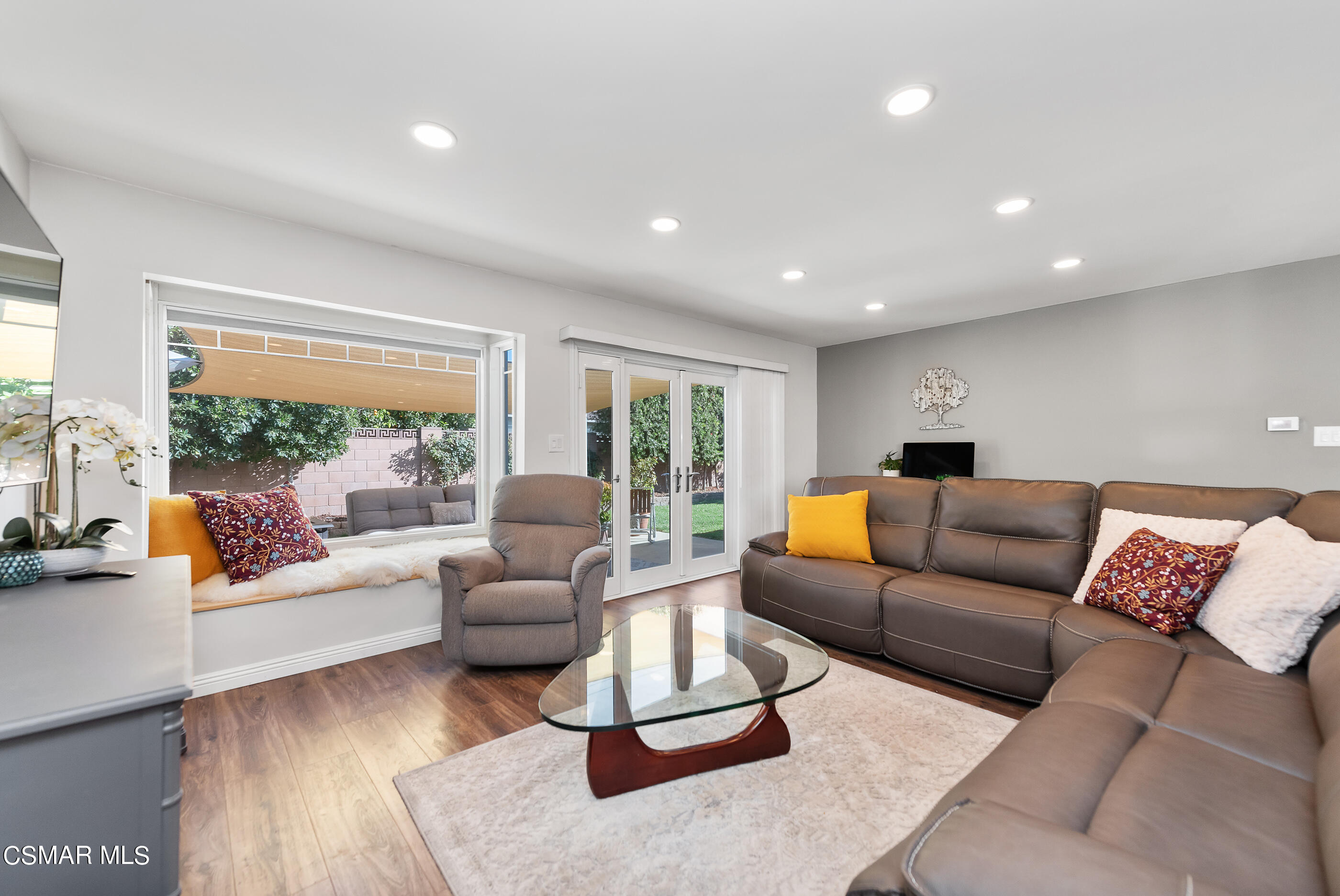 2066 Hurles Avenue Simi Valley, CA 93063 - Photo 15 of 50 a living room with furniture and a large window