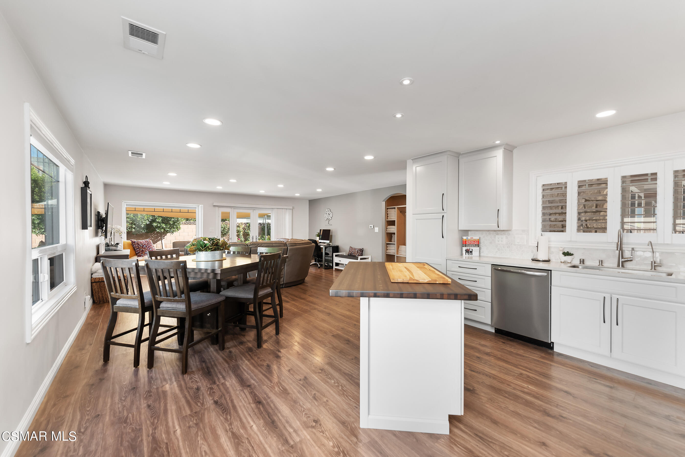 2066 Hurles Avenue Simi Valley, CA 93063 - Photo 20 of 50 a view of a dining room with furniture and wooden floor