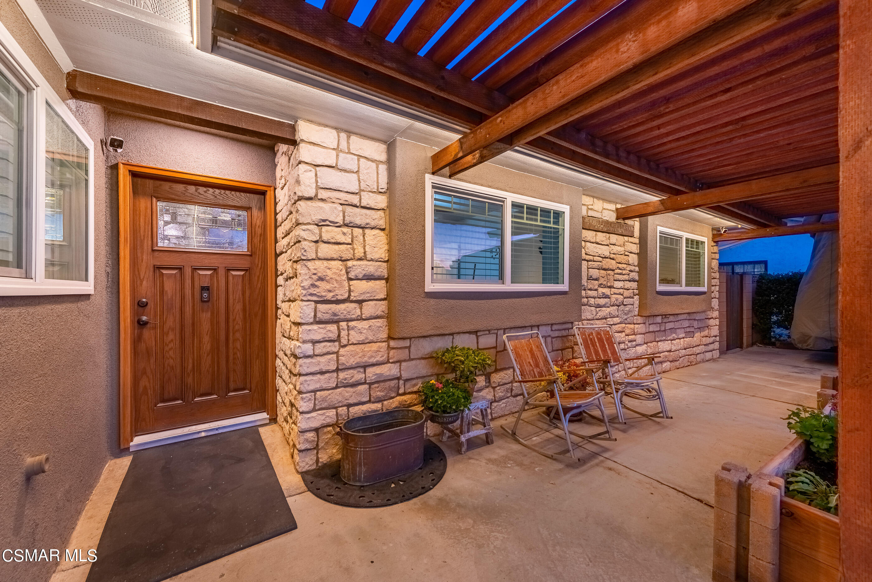 2066 Hurles Avenue Simi Valley, CA 93063 - Photo 3 of 50 a view of a porch with furniture and barbeque area