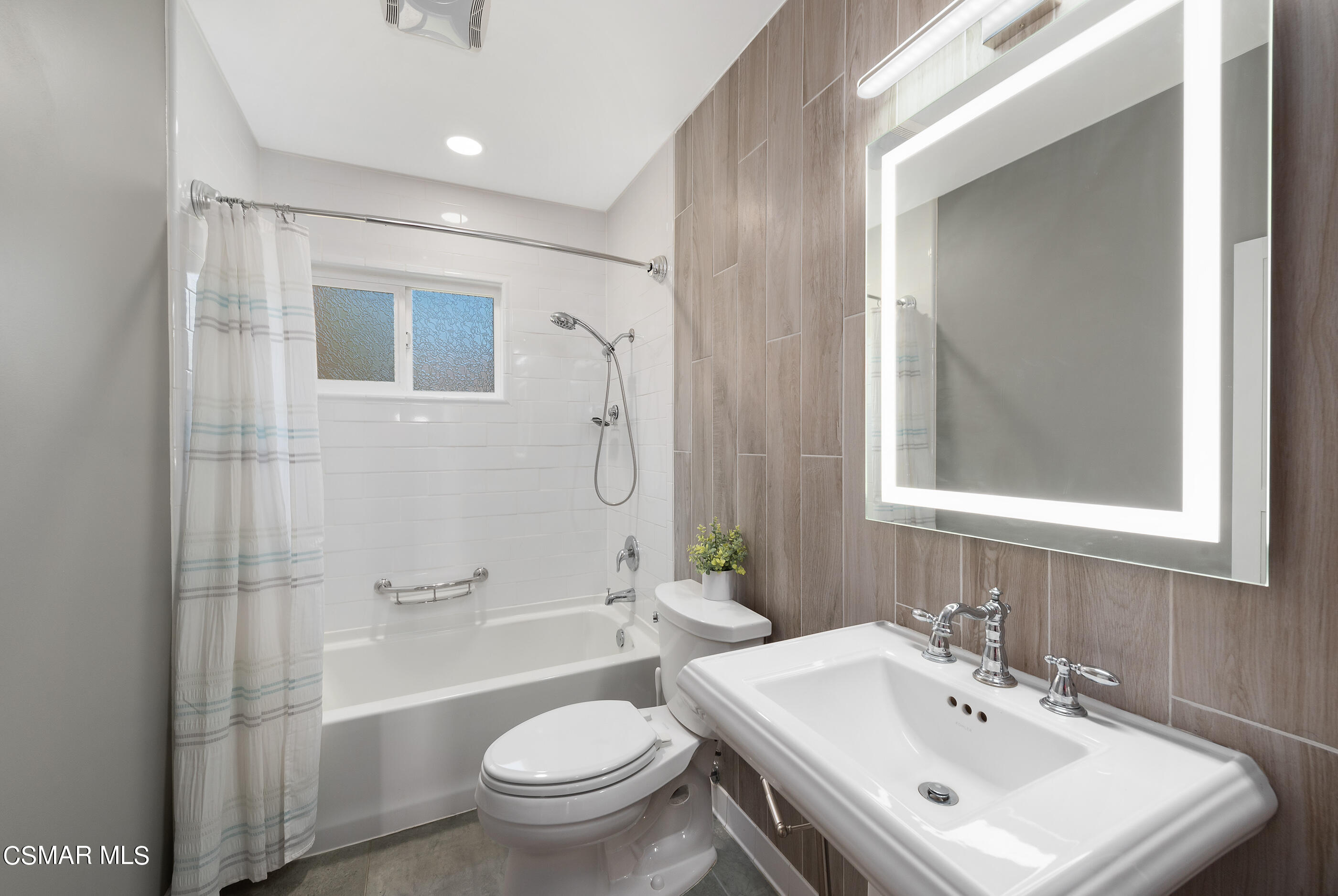 2066 Hurles Avenue Simi Valley, CA 93063 - Photo 25 of 50 a bathroom with a sink toilet and shower