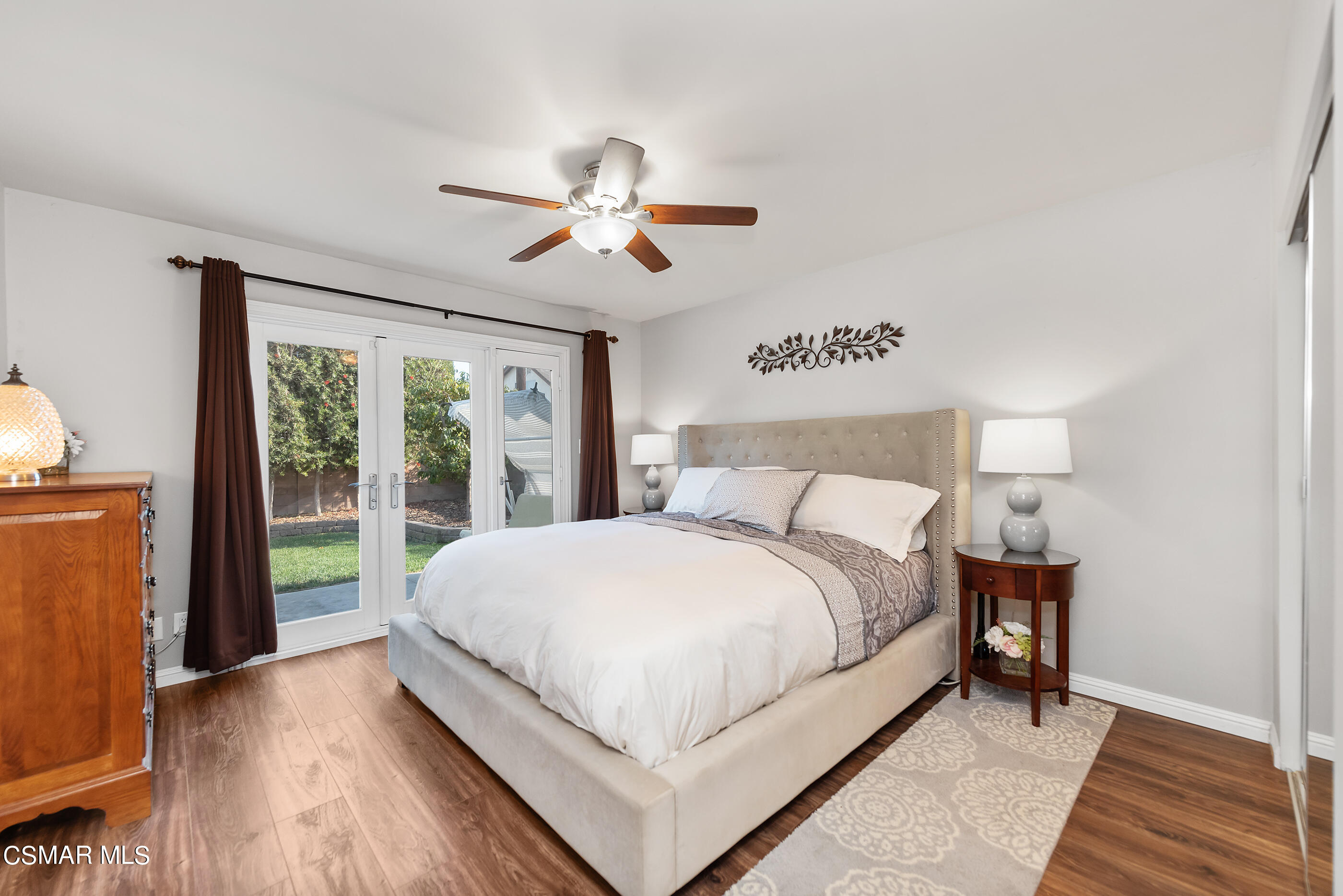 2066 Hurles Avenue Simi Valley, CA 93063 - Photo 28 of 50 a large bedroom with a bed and a large window