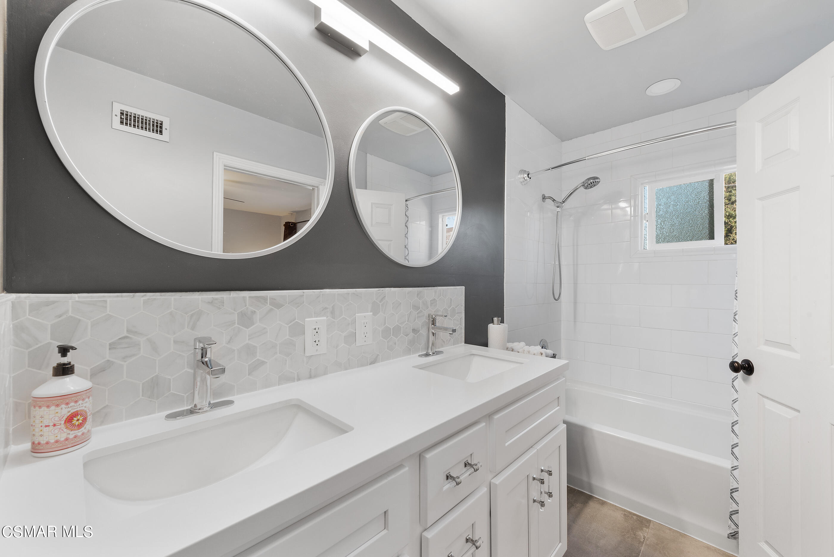 2066 Hurles Avenue Simi Valley, CA 93063 - Photo 30 of 50 a bathroom with a sink and a mirror